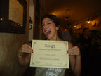 Alumna Leticia Alvares from Brazil after completing her pesto cooking class as part of the program cultural activity in Turin, Italy.